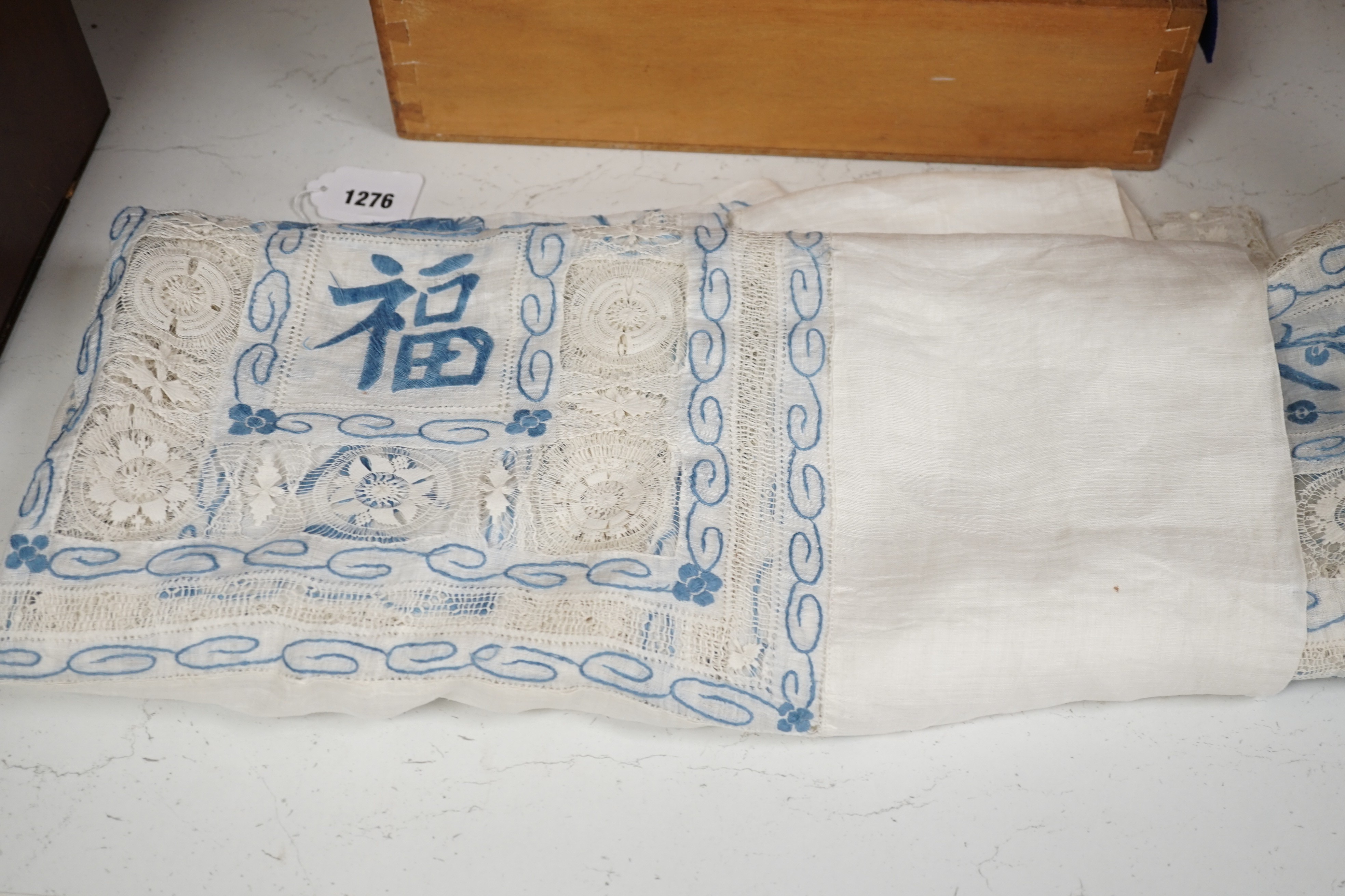 An early 20th century Chinese embroidered linen 'dragon' table cloth